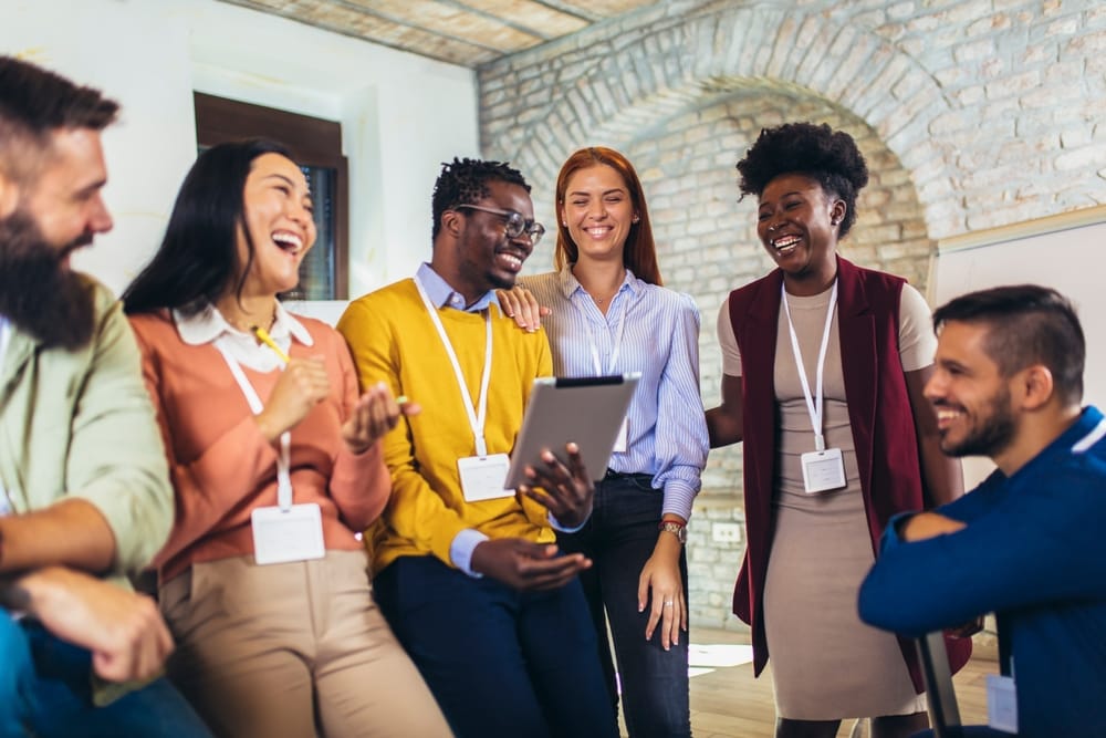 happy,business,team,at,corporate,training,,team,building,activity,,diverse